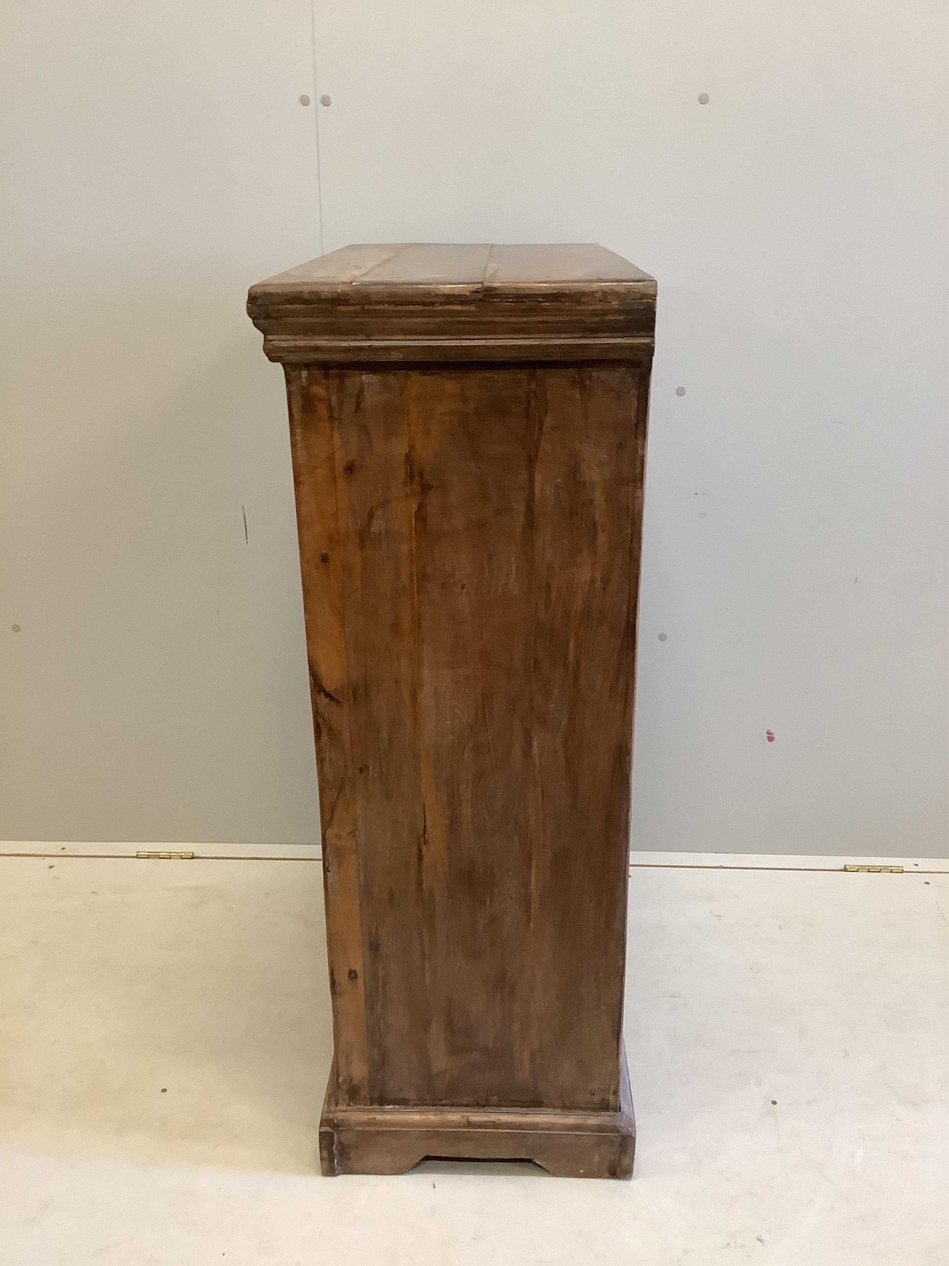 An Indonesian carved hardwood two door side cabinet, width 74cm, depth 39cm, height 112cm